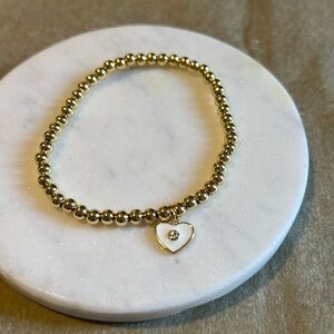 Heart charm gold bracelet